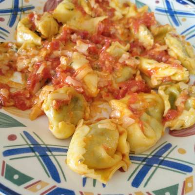 Tortellini De Espinacas Con Salsa De Mantequilla Y Tomate Receta De