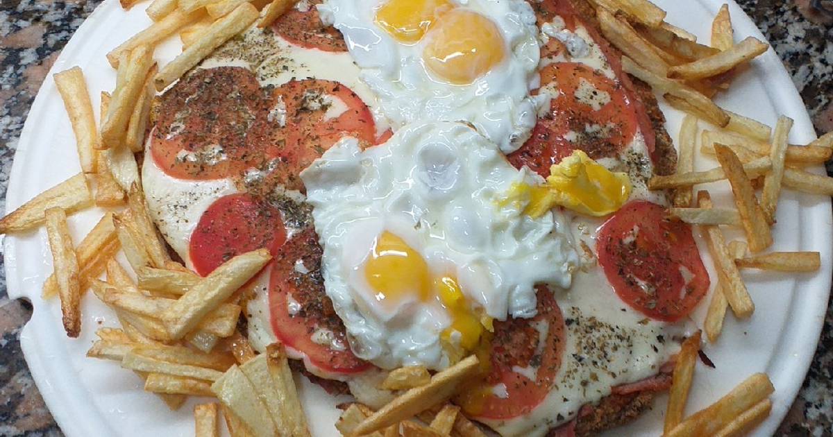 Milanesa Gigante A La Pizzanesa Receta De J D Schultheis Cookpad