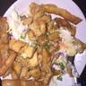 I could not for the life of me get these wontons to stay in form for tacos! Lol however I cut up the wonton wrappers in strips fried those n then layered the coleslaw on top with chicken on top and then sprinkled with extra terakyi sauce and green onion...Cut up the chicken breast when they are almost completely froze super easy to dice. they were supppper yummmy thanks for this spot on recipe