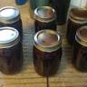 Good start for a recipe. Needs alot of tweeks in my opinion though. First i decided to add 3.5 cups of water to start. Didnt want it too sweet so i went with 2 cups of sugar. Then another 2 cups of everclear. I always can my flavored moonshine so i had all my jars processed and filled. I only made it out with 3 jars. (started doing the math on the suposed 5-6 pints.. I dont think your going to get another 5 or so cups of liquid from the berries.) Then i tasted it. Way too sweet. Like drinking syrup. And very strong. (Flavored moonshine usually takes a week to a month to mellow out.) So i dumped out the cans into a bowel and watered it down alot more. Dont know how much. Id say about another 1 or 2 cups of water. Ended up getting 6 jars total. But still a good recipe to start with.