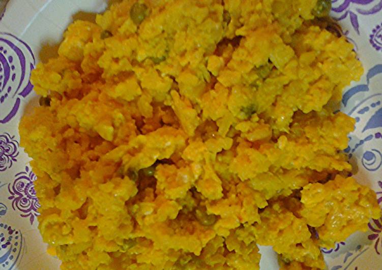 Scramble eggs with leftover yellow rice and chicken Recipe by