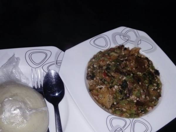 White bitter leaf okro soup with semo