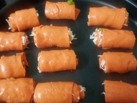 Cheesy Beetroot khandvi roll recipe step 17 photo