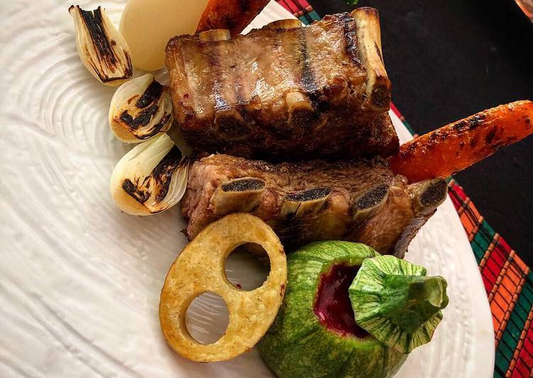 
    Costilla de Cerdo con Vegatales al Grill y Salsa de Tuna al Vino Tinto
  