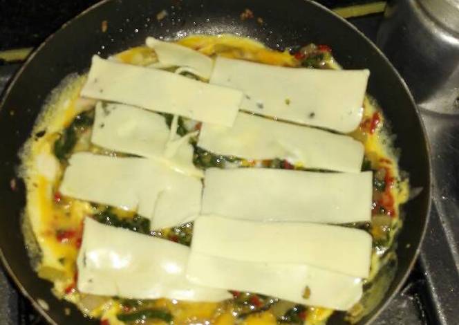 
          Acelgas con huevo y queso
        