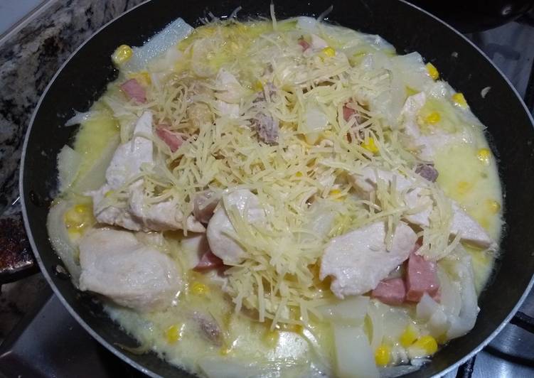 
    Pollo con queso parmesano y queso crema
  