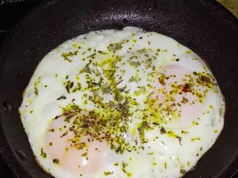 Photo from step 4 of the recipe Fried eggs in tomato and oregano mincemeat