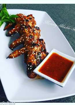 Barbecued chicken wings with spicy sauce