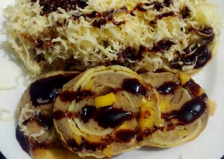 Resep Rollade Pisang Nangka topping Coklat Keju Oleh mel's kitchen