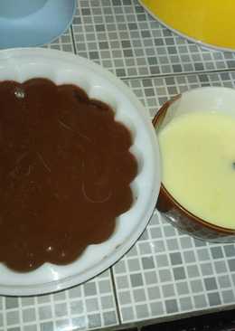 Brown milk dark puding with milk vanilla sauce