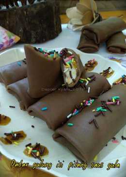 Dadar Gulung Isi Pisang Saus Gula