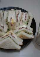 Ham sandwiches and banana juice