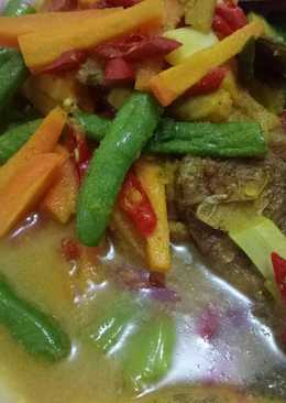 Pesmol(gulai kuning) ikan nila