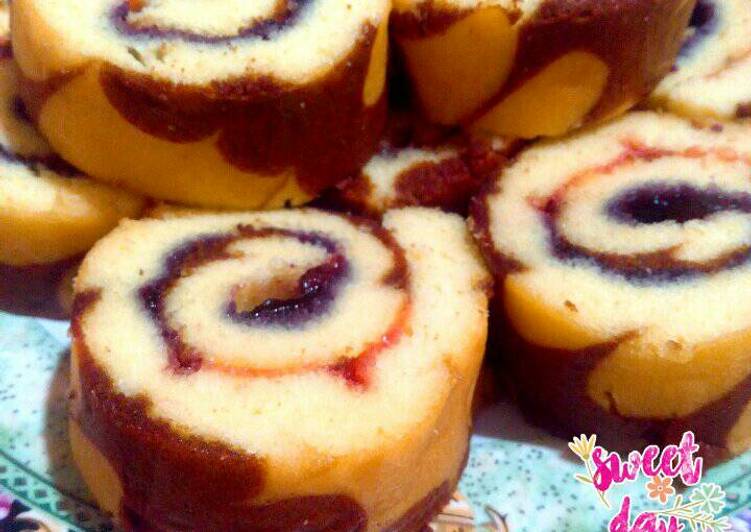 gambar untuk resep Blueberry Swiss Roll Cake / Bolu Gulung