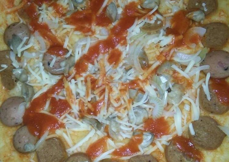 Resep Pizza teflon ala rumahan Oleh bunda raisya