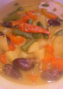 Jantung ayam dan sayuran masak kuning