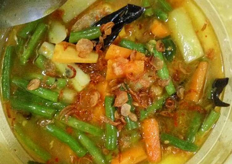 bahan dan cara membuat Bumbu Kuning Kepala Kakap Bubu