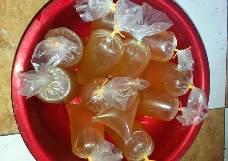 cara membuat Es jamu kuning + sinom