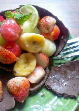 Fruits salad in chocolate bowl