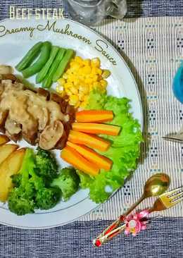 Beef steak with creamy mushroom sauce