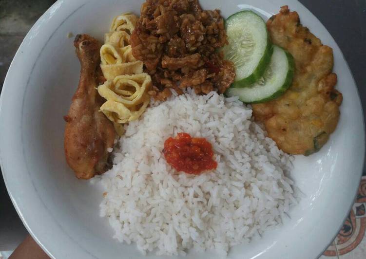 Resep Nasi uduk magic com By Rini Hasrita