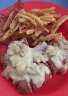 Bratwurst with mushroom cream sauce (+ bacon & french fries)