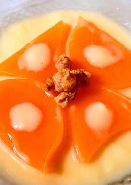 Milk manggo pudding soak in fla with disco bean garnish