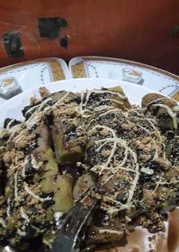 Pisang rebus toping coklat kacang