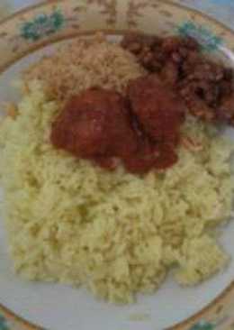 Nasi kuning with masak merah ikan haruan/gabus