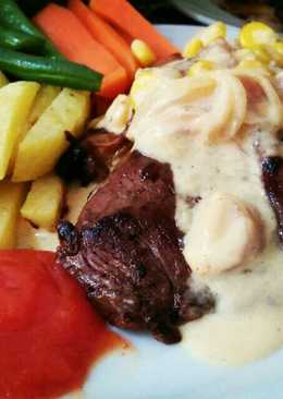 Beef steak with cheese bolognese