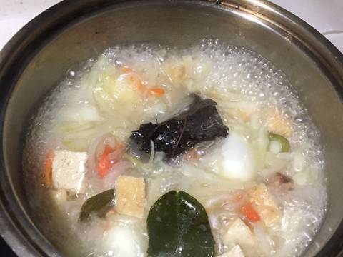 Lodeh pepaya muda, telur,tahu dan petai recipe step 3 photo