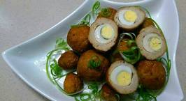 Hình ảnh món Thịt Bọc Trứng Cút Kho Dừa Tươi