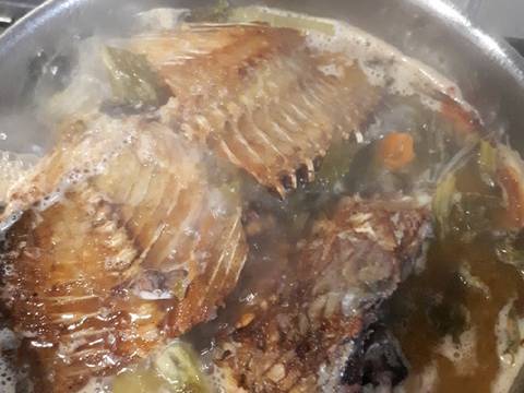 Canh đầu cá nấu dưa chua recipe step 9 photo