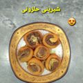 کوک اسنپ طاها دهقانی بعد از امتحان کردن شیرینی حلزونی.