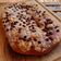El cooksnap de Toni Martín cuando hizo Coca de Sant Joan v3: De naranja confitada, almendras y pepitas de chocolate rellena de trufa y nata.