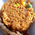Lick Fingers (Abj Moms)'s cooksnap of when they made Jollof rice with fried chicken and cucumber.