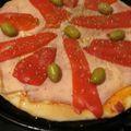 El cooksnap de mariela cuando hizo Pizza de mozzarella, jamón y morrón.
