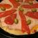 El cooksnap de mariela cuando hizo Pizza de mozzarella, jamón y morrón.
