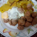 El cooksnap de Diana Reina cuando hizo Butifarras con salsa de vino tinto, patatas al horno y huevos.
