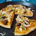 Jhulan Mukherjee's cooksnap of when they made নো ওভেন নো ইস্ট চিকেন পিজ্জা (Chicken pizza recipe in bengali).