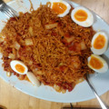 Norikazu Owen Ogawa's cooksnap of when they made Jollof noodles with boiled egg.