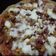 El cooksnap de Natalie camargo cuando hizo Pizza Margarita a base de avena y zucchini con queso de almendras y albahaca fresca.