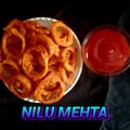 Nilu Mehta का कुकस्नैप जब उन्होंने प्याज के छल्ले के पकौड़े (pyaz ke challe ke pakode recipe in Hindi) बनाया था।