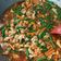 Cooksnap Dania Halim semasa beliau membuat Ayam Daun Selasih (Pad Krapow).