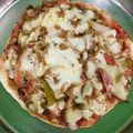 Monika Kashyap का कुकस्नैप जब उन्होंने कैप्सिकम चीज़ मिनि पैन पिज़्जा (Capsicum cheese mini pan pizza recipe in Hindi) बनाया था।