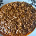 Cooksnap Qasrina semasa beliau membuat Nasi Kapit Kuah Kacang.