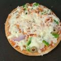 Bhavini Naik's cooksnap of when they made વેજ ચીઝ પિઝા (Veg Cheeze Pizza in Gujarati).