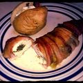 Hannah's cooksnap of when they made stuffed chicken wrapped in bacon.