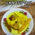 Cooksnap Hani Shaimi semasa beliau membuat Ikan Baung masak lemak cili api.