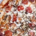 Cooksnap de MJ quando cozinhou Pizza.